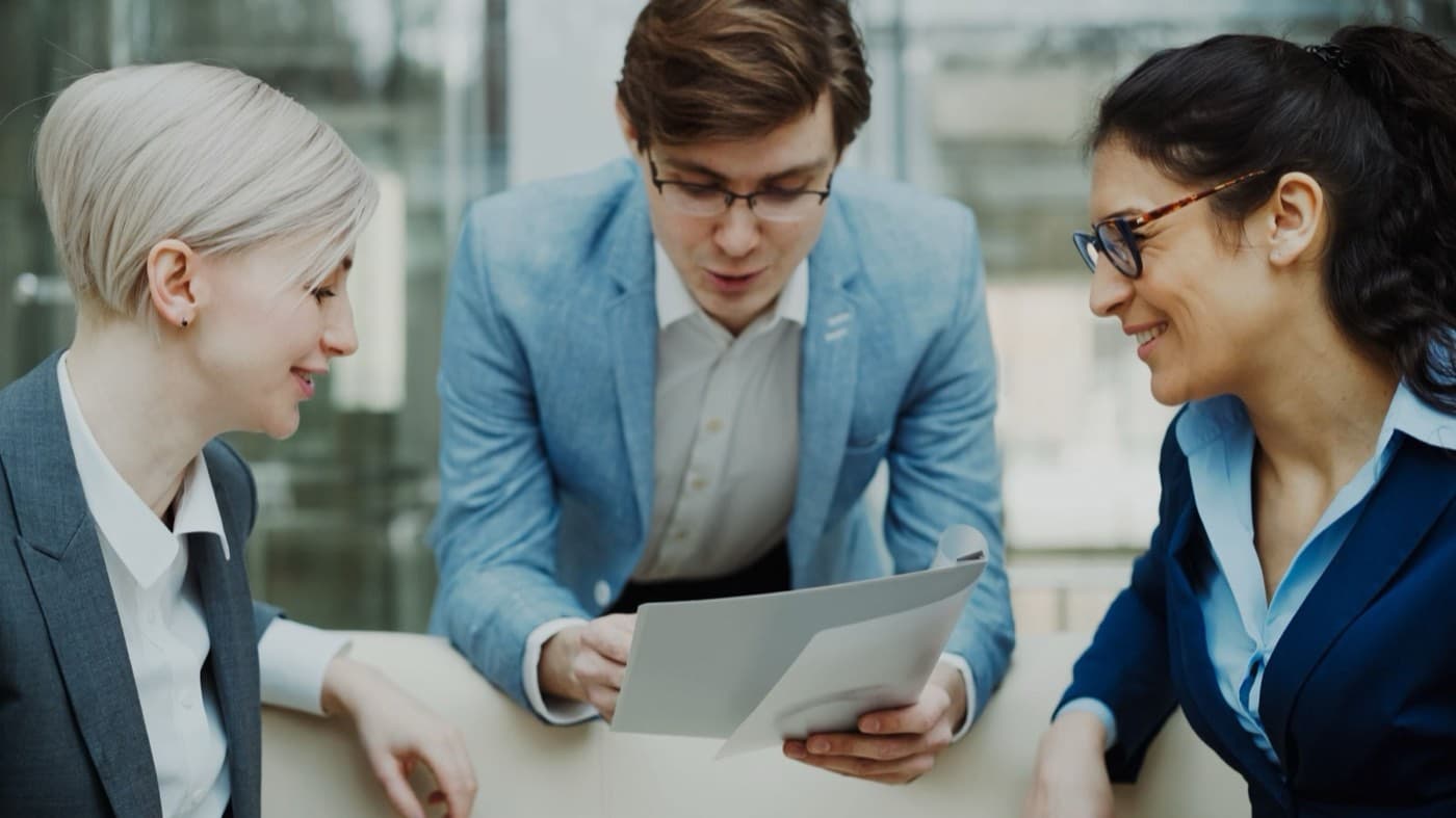 Balance scale weighing the cost and time of CAPM certification against its career value